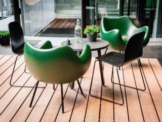 Green chairs in lounge area